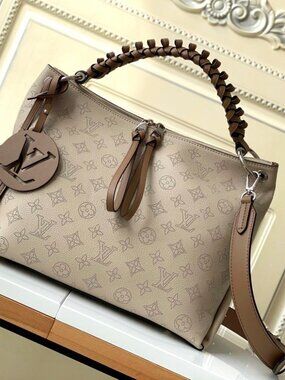 Louis Vuitton perforated handbag Backpack satchel